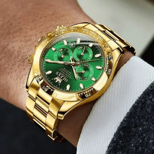 Men’s gold automatic watch with vibrant green dial, worn on wrist for elegant business style.