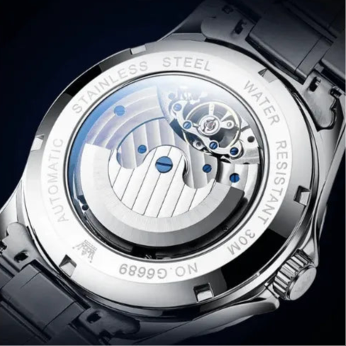 Automatic Open Heart Sky Watch showing transparent case back and movement details.