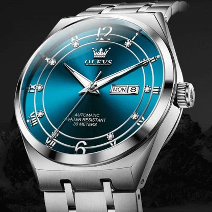 Sophisticated silver watch with automatic movement and blue display.