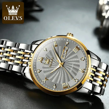 Business style men’s watch in silver and gold with mechanical precision.