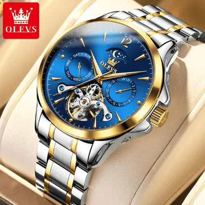 Automatic men’s watch with blue dial, moon phase display, gold and silver stainless steel bracelet, luxury skeleton design.