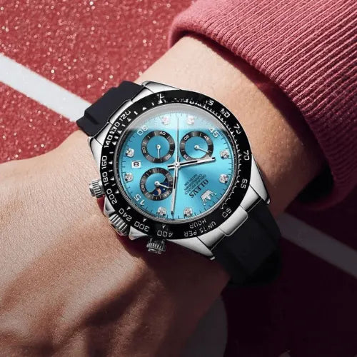Dominant Chronograph Blue Silver men’s watch worn on wrist, showcasing sporty elegance with luminous markers.