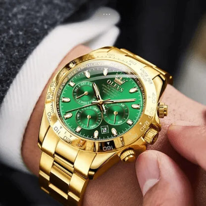 Men’s luxury automatic wristwatch with green dial and golden case, worn on wrist with chronograph subdials and polished bracelet.