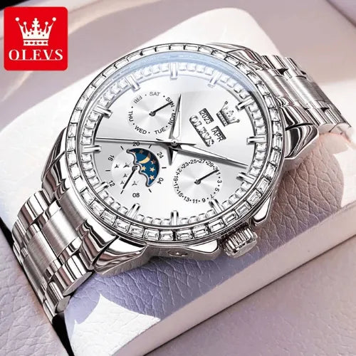 Luxury automatic men’s watch in silver with moon phase and multi-calendar display, showcased on a watch box.