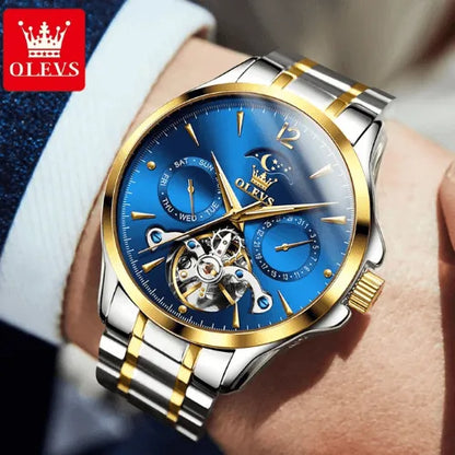 Men’s luxury automatic watch with white dial, moon phase display and stainless steel bracelet in silver and gold.