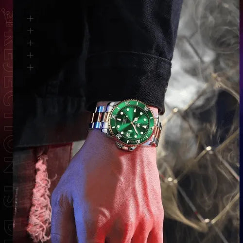 Men’s stylish automatic wristwatch with green dial, luminous hands and two-tone strap, worn for a modern lifestyle look.