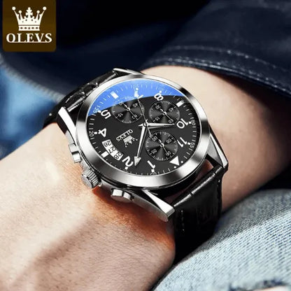 Stylish OLEVS men’s black chronograph watch displayed on wrist with leather strap and luminous hands.