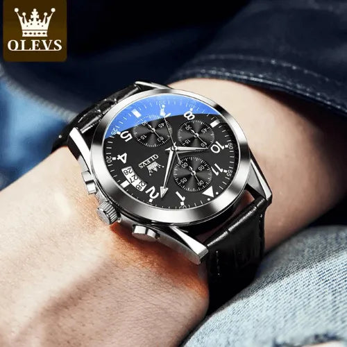 Stylish OLEVS men’s black chronograph watch displayed on wrist with leather strap and luminous hands.