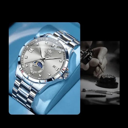 Stylish OLEVS business quartz watch with grey dial, moon phase and diamond markers.