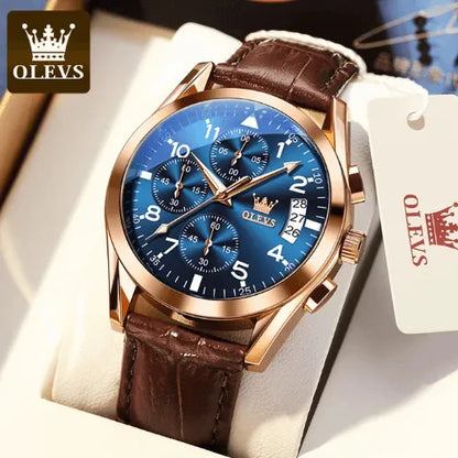 Luxury OLEVS chronograph men’s watch with blue dial, rose gold case and brown leather strap displayed in gift box.
