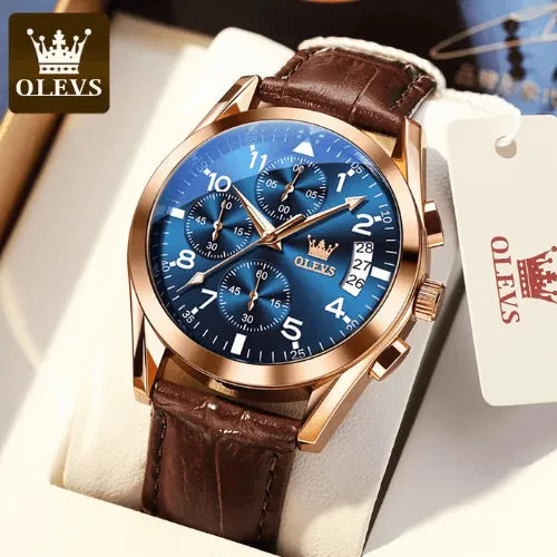 Luxury OLEVS chronograph men’s watch with blue dial, rose gold case and brown leather strap displayed in gift box.