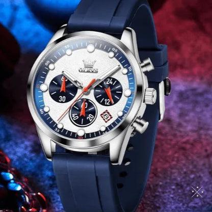 Stylish OLEVS chronograph men’s watch with blue strap displayed in a lifestyle setting.