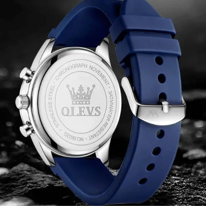 Back view of OLEVS chronograph watch showing stainless steel case and brand engraving.