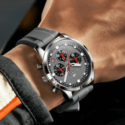 OLEVS men’s grey chronograph watch with silicone strap, shown on wrist for a sporty elegant look.