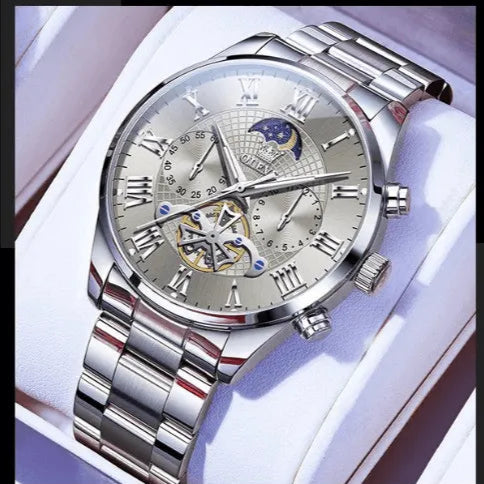 Luxury OLEVS men’s stainless steel watch with silver dial and moon phase display, presented in gift box.