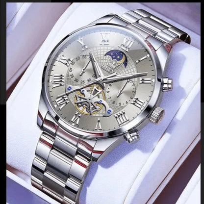Luxury OLEVS men’s stainless steel watch with silver dial and moon phase display, presented in gift box.