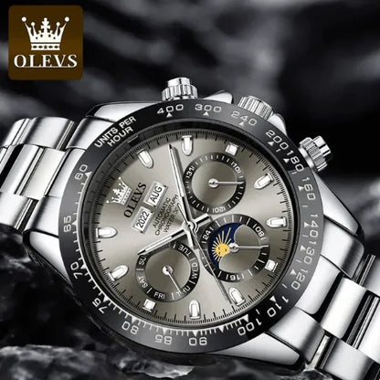 Luxury men’s grey automatic watch with stainless steel bracelet and chronograph display.