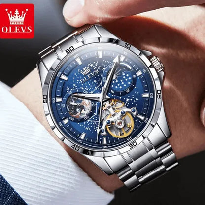 Stainless Steel Sky Dial Watch on wrist with starry blue face and tourbillon feature.