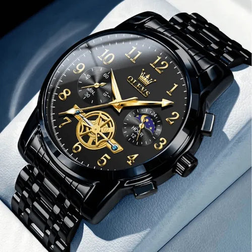 Titan luxury men’s chronograph watch in black with gold accents, showing moon phase and chronograph sub-dials.