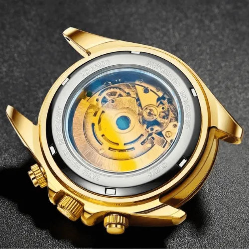 Open case back of the Classic Gold Automatic Watch revealing automatic mechanical movement.