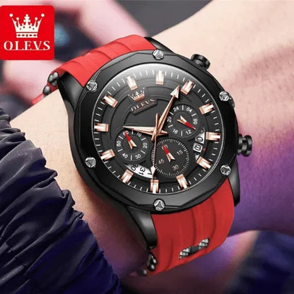 Men’s Flame Racer chronograph watch with red strap and black dial worn on wrist.