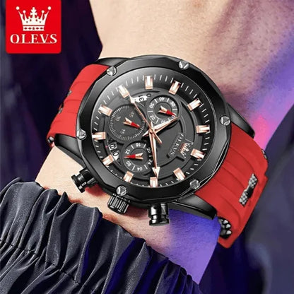 Men’s chronograph Flame Racer with red silicone strap and black dial, shown on wrist with side buttons visible.