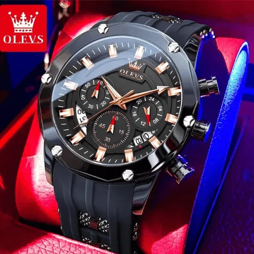 Luxury men’s chronograph Night Force watch in black and gold displayed in a red case.