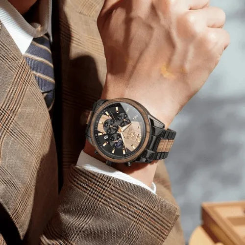 Close-up of men’s chronograph watch with wood bezel and luminous hands