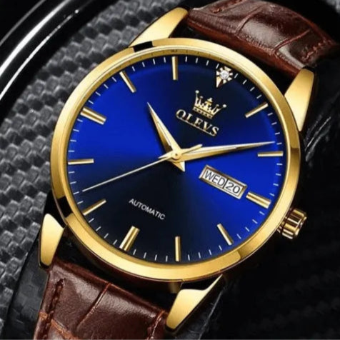 OLEVS men’s business watch with luminous hands, blue dial and automatic movement.