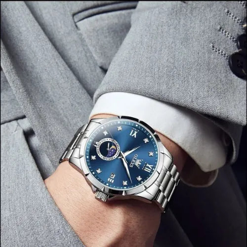 Men's OLEVS Business Quartz blue wrist watch, executive style with moon phase and classic dial.