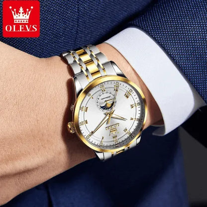 Men’s silver and gold automatic OLEVS watch styled with formal attire.