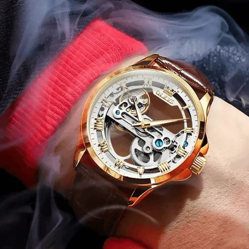 Elegant men’s skeleton watch with gold case, luminous hands, and leather strap.